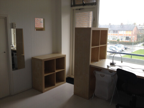 It has storage and mirrors and a built in closet.